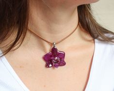 Why this orchid necklace choker? 🍃 Why a real flower resin necklace? Moments before the Palace of Versailles was overrun by the angry hordes, King Louis XVI placed an orchid pendant around the neck of his beloved Marie Antoinette 🌸 You want to know why? Follow me... I collected this little orchid with all my love and respect to craft this purple flower necklace to make you feel that the most beautiful thing in nature is on your neck ✨ An orchid necklace choker that you won't find anywhere else Real Orchid Jewelry, Fig Necklace, Orchid Pendant, Resin Flower Jewelry, Etsy Necklace, Purple Flower Necklace, Orchid Necklace, Orchid Jewelry, Flower Necklaces