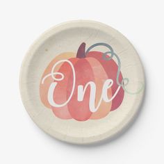 a paper plate with the word one painted on it and a pumpkin in the middle