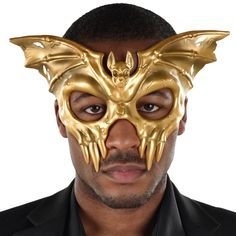 Buy the Gold Winged Skull Adult Mask at Michaels. com. Protect your identity with this Gold Winged Bat Skull. This stylish accessory features a terrifying bat face and large wingspan. Perfect for masquerades and Halloween. Protect your identity with this Gold Winged Bat Skull. This stylish accessory features a terrifying bat face and large wingspan. Perfect for masquerades and Halloween. Costume not included. One size fits most teens and adults. Details: Gold colored One size fits most teens and Furrowed Brow, Bat Face, Bat Mask, Bat Skull, Gold Man, Masquerade Theme, Winged Skull, Honeycomb Decorations, Wedding Tableware