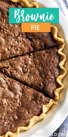 a brownie pie on a white plate with the words brownie pie above it