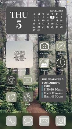 an iphone screen with the calendar on it and other icons in front of it, including trees