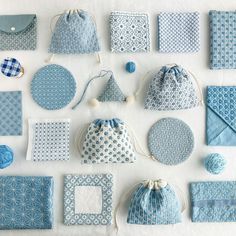 blue and white items are laid out on a table