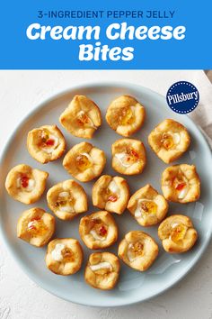 a white plate topped with mini pies on top of a blue and white table