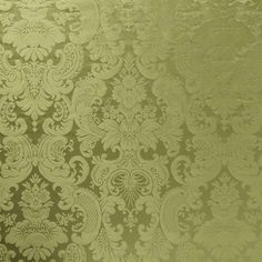 a gold wallpaper with an intricate design on it