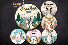 four coasters with different animals on them and the words laser cut in white lettering