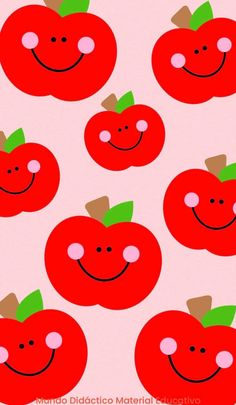 red apples with green leaves and smiling faces