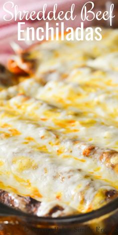 an enchiladas dish with melted cheese on top in a casserole dish