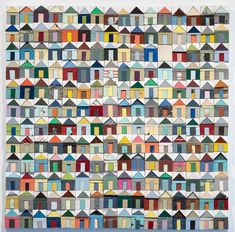 an image of many houses that are made up of different colors and shapes, including the roof