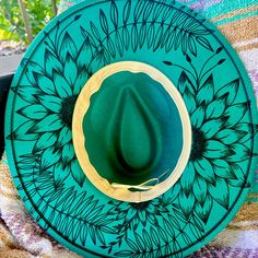 This One Of A Kind, Custom, Faux Suede Boho Hat Will Make You Stand Out In Any Crowd. Sunflowers Are Custom Burned Into Durable Faux Suede And Acrylic Paint Added To Make It Extra Unique. The Brim Is 9.5 Inches And The Band Is Adjustable To Accommodate Just About Any Head Size (56-58 Cm). Sunflower Burned Hat, Green Wide Brim Felt Hat For Beach, Adjustable Green Felt Hat For Beach, Green Spring Hats For Country Events, Green Hats For Spring Country Events, Green Hats For Country Events In Spring, Burned Hat Design, Burnt Hats, Hat Burning