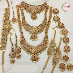 Premium Matt Finish Gold Plated South Indian Bridal Necklace Set With Maangtikka, Hair jewels, Waist Belt, Armlet | Women Party Wear Jewelry Item Includes   3 NECKLACE SET 1 MAANGTIKKA 1 PAIR EARRING 1 WAIST BELT 2 ARMLET 9 HAIR PINs Description Introducing our exquisite Premium Matt Finish Gold Plated South Indian Bridal Necklace Set with Maangtikka, Hair Jewels, Waist Belt, Armlet. This meticulously crafted jewelry ensemble is designed for women who want to make a statement at weddings, parties, and other special occasions. This stunning set includes three captivating necklace pieces, each showcasing intricate patterns and delicate embellishments. The layered effect created by these necklaces adds a touch of opulence and elegance to your attire, highlighting your unique style. Enhancing Indian Bridal Necklace, Unique Wedding Jewelry, Dazzling Earrings, Hair Jewels, Bridal Elegance, Bridal Necklace Set, South Indian Jewelry, Bridal Jewellery Indian, Women Party