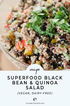 a bowl filled with black bean and quinoa salad