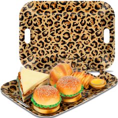 an animal print tray with hamburgers and cheese