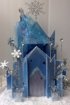 a frozen castle with snowflakes and decorations