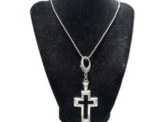 This necklace has a cut-out cross in silver tone. It measures 1.5 inches wide by 4 inches long. The ball chain measures 22 inches long. This is suitable for any gender. Necklace Chunky, Ball Chain, Pendant Necklaces, Cross Necklace, Necklace Etsy, Jewelry Necklace Pendant, Silver Tone, Cut Out, Bathing Beauties