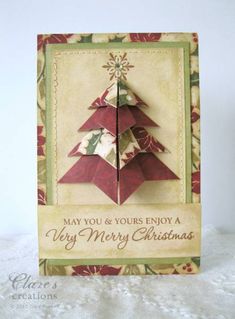 an origami christmas card with a tree on it