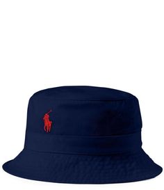 From Polo Ralph Lauren, this hat features: bucket silhouetteRalph Lauren's signature Pony and "Polo" embroidered at the frontseamed brim1" band around the crownsweatband at the interiorcottonspot cleanImported. Blue Bucket Hat, Kids Bucket Hat, Logo Azul, Polo Sport, Cotton Chinos, Mens Chinos, Bucket Hats, Casual Streetwear