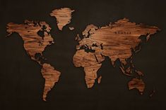 a wooden world map is shown on a black background with the name of the country