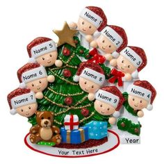 a personalized christmas tree ornament with children around it