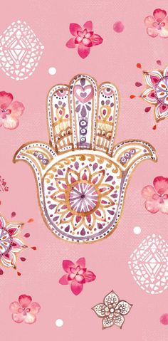 a pink background with an ornate hamsah on it