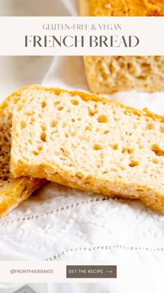 two pieces of bread sitting on top of a white napkin