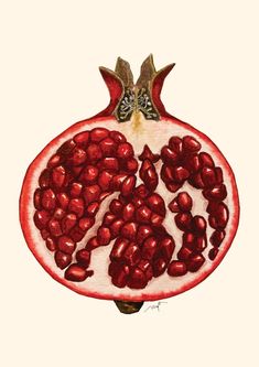 the pomegranate is cut in half and ready to be eaten