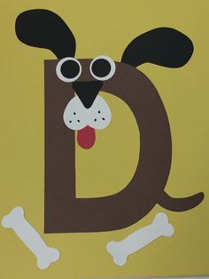 the letter d is for dog with bones on it's face and eyes,