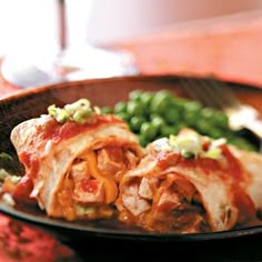 a close up of a plate of food with meat and veggies on it