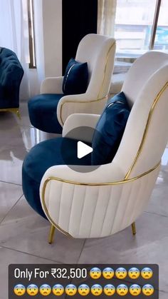 two white and blue chairs sitting next to each other