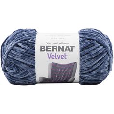 bernat velvet yarn ball in blue and pink, on a white background with the label