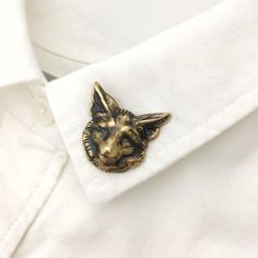 This brass fox pin is manufactured, hand assembled and hand finished in the USA! The fox itself is a shell-back brass stamping made from a super-antique mold that may even date back to the Victorian era! These fox lover pins can be worn however you like: as a lapel pin or on a collar or a jacket or a bag, etc... Any garment or soft accessory would be improved greatly when graced by this handsome fellow. This unisex fox brooch makes the perfect fox lover gift! Fox jewelry is ideal for you or for Fox Brooch, Spider Jewelry, Fox Jewelry, Fox Face, Fox Lover, Insect Jewelry, Animal Brooch, Geek Gifts, Red Fox