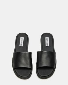 Classic Synthetic Slides, Classic Flat Slides With Removable Insole, Classic Slides With Removable Insole, Classic Flat Mules With Textured Footbed, Classic Synthetic Slip-on Slides, Classic Slip-on Synthetic Slides, Classic Black Slides With Textured Footbed, Classic Spring Slides With Rubber Sole, Classic Black Summer Slippers