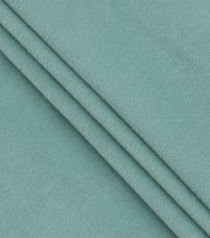 a close up shot of the fabric in aqua blue, which is very soft and soft