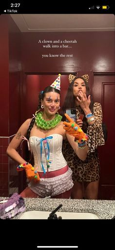 two women in costumes taking a selfie in a bathroom with the caption, you know the rest