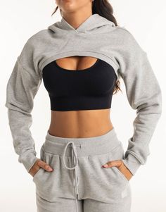 Meet the High Cut Hoodie, the perfect layering piece that deserves to be a part of the all-year rotation. The ultra cropped length is the High Cut Hoodie's best attribute, great for showing off your sportsbra and/or bikini. Add in a hoodie and you've got a top that can provide style and warmth - Super soft cotton/polyester blend - In-trend ultra cropped silhouette - Large hood - Designed to flatter every size - Worn by our inhouse team for the perfect fit 62% Cotton, 38% Polyester Bella is wearing a Small She is 170cm (5'6") tall with an 33" bust, a 25" waist and 36" hip Hoodie With Hoop Earrings, Cheap Hooded Hoodie With Ribbed Cuffs, Cheap Stretch Hooded Tops, Cheap Hooded Leisure Tops, Cheap Moisture-wicking Hooded Tops, Sporty Crop Top For Layering, Sporty Gray Cropped Top, Sporty Stretch Hoodie For Layering, Stretch Cropped Activewear For Winter