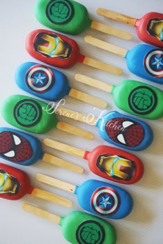 the avengers cake pops are decorated with captain america emblems