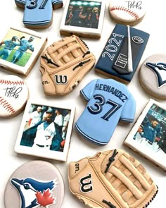 decorated cookies are arranged in the shape of baseballs and mitts with photos on them