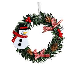 a christmas wreath with a snowman on it