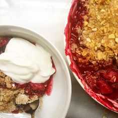 two bowls filled with food next to each other