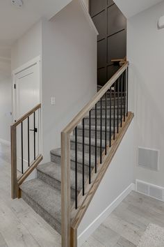 the stairs in this house are made of wood and metal