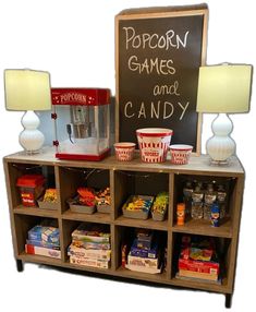 the popcorn games and candy stand has two lamps on it