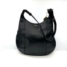 Christian Dior vintage Black Leather Malice Pearl Hobo Bag  This hobo bag features a leather body, a flat leather strap with pearl detail, a top zip closure, and an interior zip pocket Condition: Excellent, small scratch in the front Dimensions H14.57' D3.15' W10.63' Fendi Vintage, Vintage Louis Vuitton, Tote Pattern, Tote Bag Pattern, Hobo Bag, Vintage Boutique, Vintage Black, Leather Shoulder Bag, Christian Dior