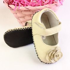 These Adorable Mary Jane Style Baby Shoes Are Perfect For Any Special Occasion Or Everyday Wear. With A Snap Closure, They Are Easy To Put On And Take Off, And The Faux Leather Outsole Makes Them Comfortable For Little Feet. They Come In A Beautiful Beige Color With A Patent Leather Upper Material That Will Make Any Little Princess Feel Like Royalty. The Shoes Feature A Variety Of Themes Including Easter, Flowers, Roses, Butterflies, Holidays, Baby Showers, Birthdays, Special Occasions, St. Patr Cute Leather Spring Booties, Cute Non-slip Leather Booties, Non-slip Leather Booties, Cute Leather Booties With Non-slip Details, Spring Brown Booties With Soft Sole, Cute Leather Non-slip Booties, Cute Cream Non-slip Booties, Cream Booties With Round Toe For Playtime, Cream Round Toe Booties For Playtime