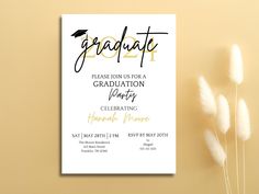 a white graduation party card with gold lettering