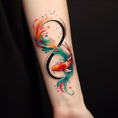 a colorful fish tattoo on the arm