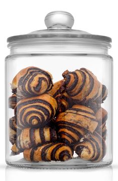 a glass jar filled with lots of cookies