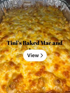 a casserole dish with cheese and meat in it's baking pan that says tini's baked mac and cheese view