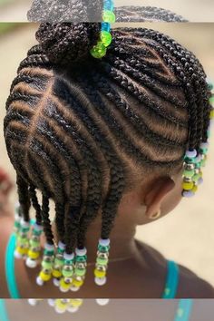 Cornrows with a Heart Shape Create a heart shape with cornrows on one side of the head while the rest of the braids go straight back or to the side. This cute design is perfect for special occasions or as an eye-catching everyday style. 3. Curved or Swirled Cornrows Instead of straight lines, try curving or swirling the cornrows in patterns that loop or spiral. This gives the hairstyle a fun, creative look, and it’s easy to add beads for a pop of color. Toddler Braid Styles, Hairstyles With Beads, Cornrows Hair, Kids Style Hair, Braids Cornrows