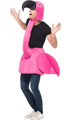 a man in a pink flamingo costume standing with his hands out to the side