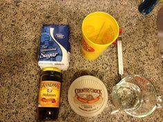 ingredients to make an ice cream sandwich sitting on a counter top next to a measuring cup