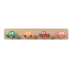 four wooden cars are lined up in a row